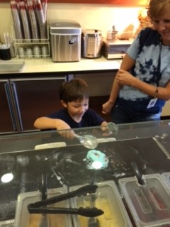 Isaac mixes ice cream.jpg