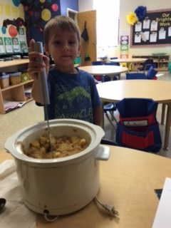 William mashes apples.jpg